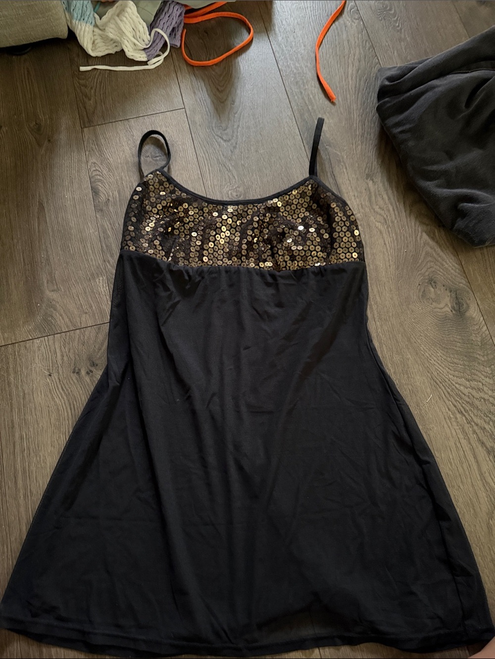 Black and gold sequin dress